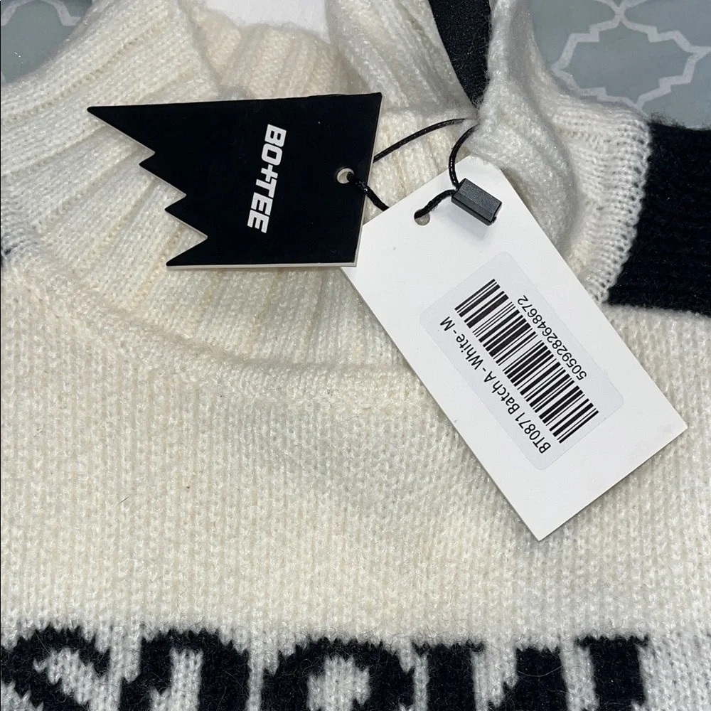 Snow Bunny Cropped Cream & Black Turtleneck Sweater